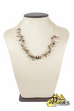 Ensemble de chaine, pendentif et de boucles d’oreilles