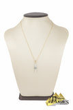 Ensemble de chaine, pendentif et de boucles d’oreilles
